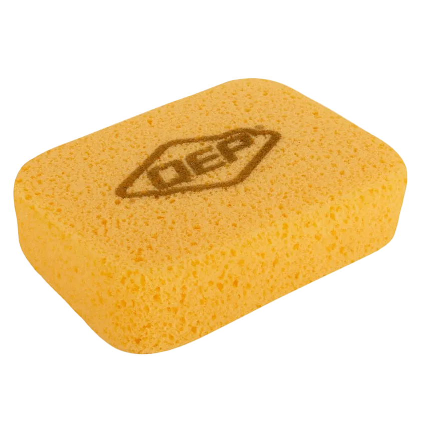 Yellow grout sponge with dark QEP logo on transparent background.