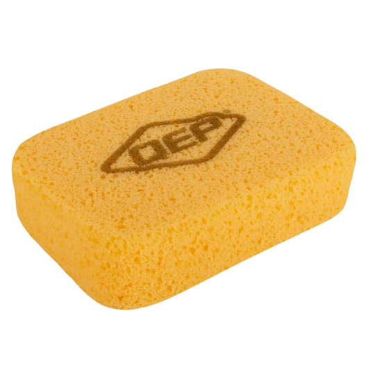 Yellow grout sponge with dark QEP logo on transparent background.