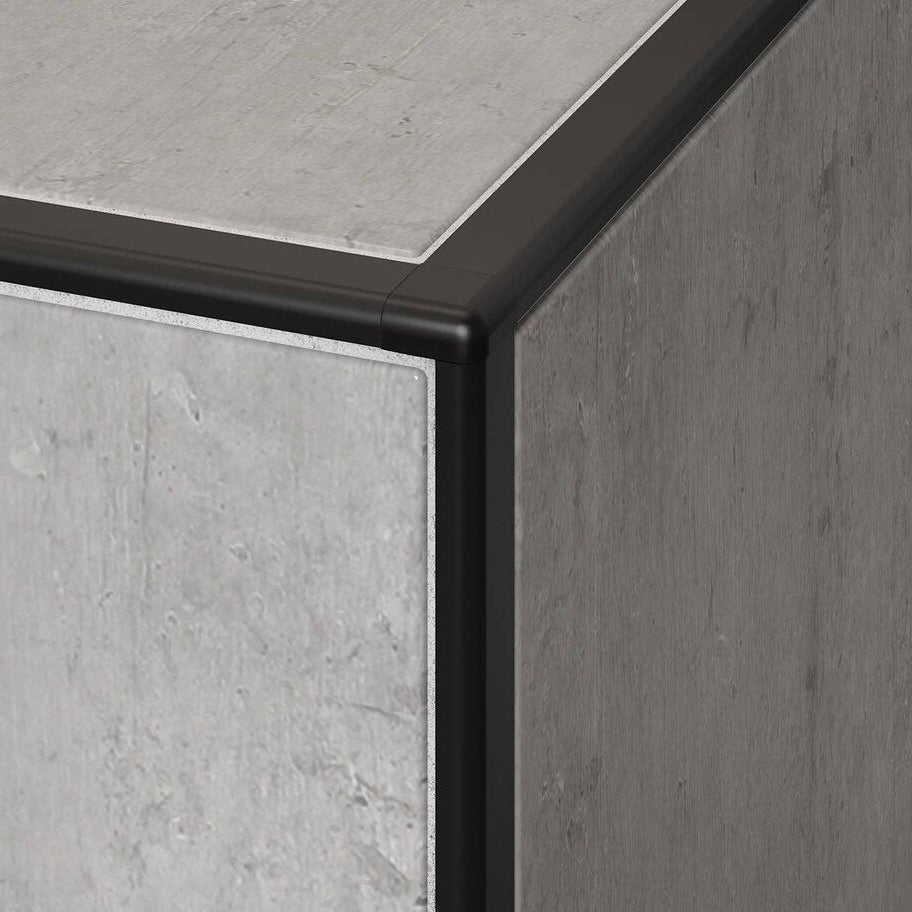 Schluter-Jolly profile installed on a bathroom tile corner.